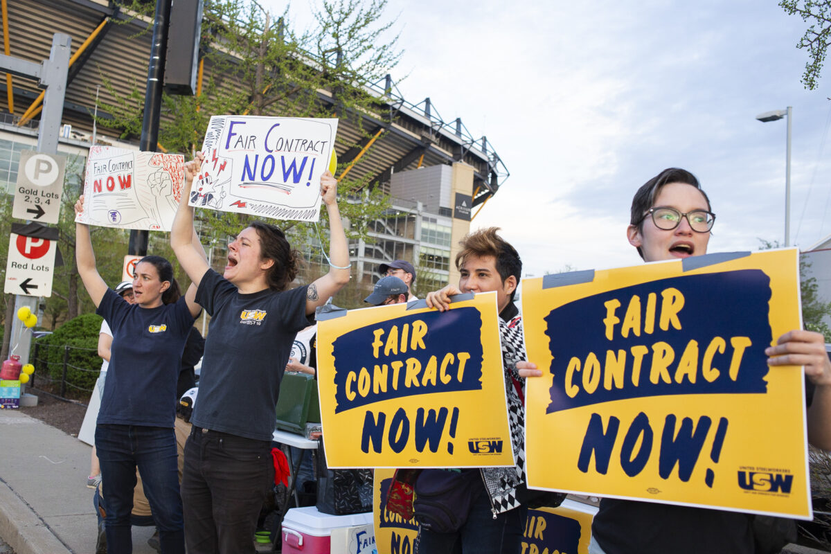 Workers at the Carnegie Museums of Pittsburgh rallied outside of the Carnegie Science Center on Friday, April 14, 2023, demanding a fair contract 18 months after they organized their union.