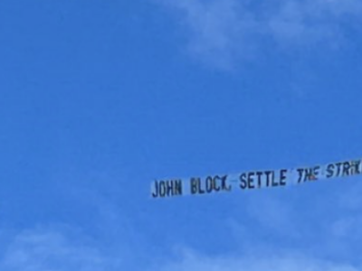 Pittsburgh news strikers make it plane for PG publisher John Block